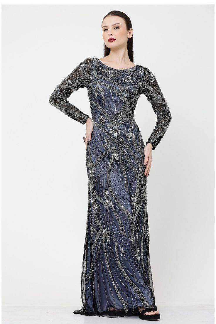 Midnight blue long gown with all-over sequins embroidery in floral and linear pattern.
Component: 1
Pattern: Hand Embroidered
Type Of Work: Floral and Linear Pattern
Neckline: Round
Sleeve Type: Full
Fabric: 100% Nylon Mesh
Color: Blue
Other Details: 
Back trail
Closure: Back zipper
Occasion: Cocktail - Aza Fashions Evening Gown With Sequins, Full Length, Sequined Maxi Length Evening Gown, Evening Maxi Gown With Sequins, Festive Maxi Length Sequin Dress For Gala, Festive Sequin Maxi Dress For Gala, Festive Blue Gown For Gala, Festive Blue Gala Gown, Sequined Long Gown For Gala, Sequin Long Dress Gown For Gala