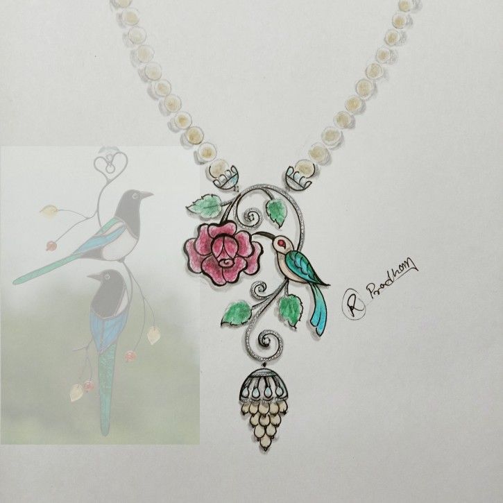 the necklace is decorated with flowers, birds and pearls on a white tablecloth next to a drawing of a bird