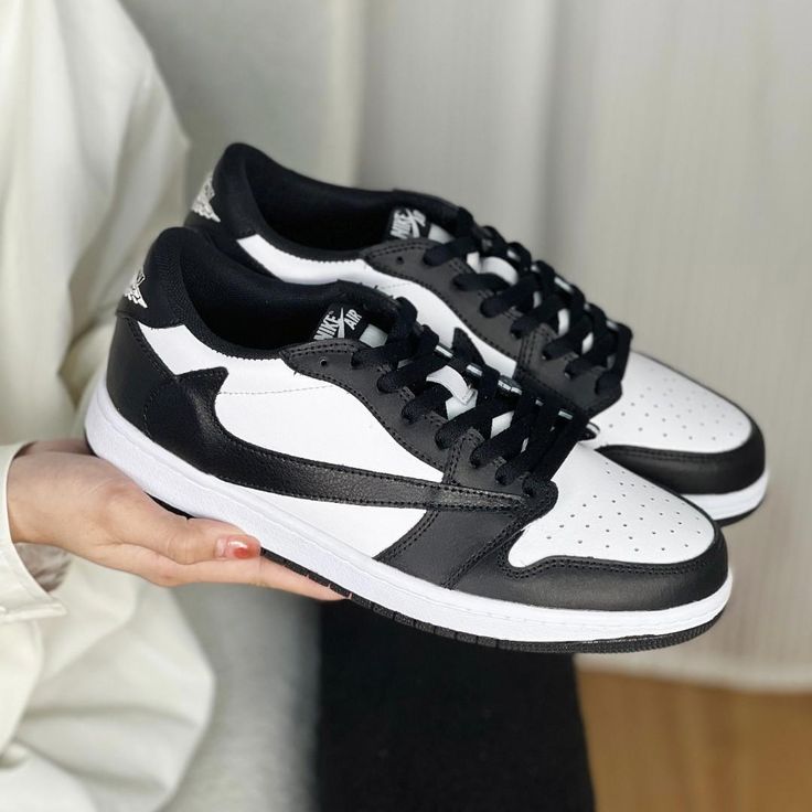 The TravisScott Black White Custom Air Jordan 1 Low is a must-have for any sneakerhead. With its unique black and white design, this stylish shoe is sure to turn heads. Crafted with a lightweight yet durable material, this shoe provides superior comfort and excellent performance. - Exactly as shown in the pictures. - Brand New & Authentic. 💯 - Hand Painted with attention to detail. 👨‍🎨 - Waterproof and Flexible. ❤️ - Unisex model. Please refer to the Size Chart. - Free Worldwide Shipping. ✈︎ Black Lace-up Skate Shoes With Boost Midsole, Black Low-top Sneakers With Laces, Modern Black Lace-up Basketball Shoes, Sporty Black Custom Sneakers With Laces, Black Breathable Low-top Skate Shoes, Black Sporty Skate Shoes With Vulcanized Sole, Sporty Black Skate Shoes With Laces, Black Custom Lace-up Sneakers With Rubber Sole, Black Lace-up Custom Sneakers With Rubber Sole