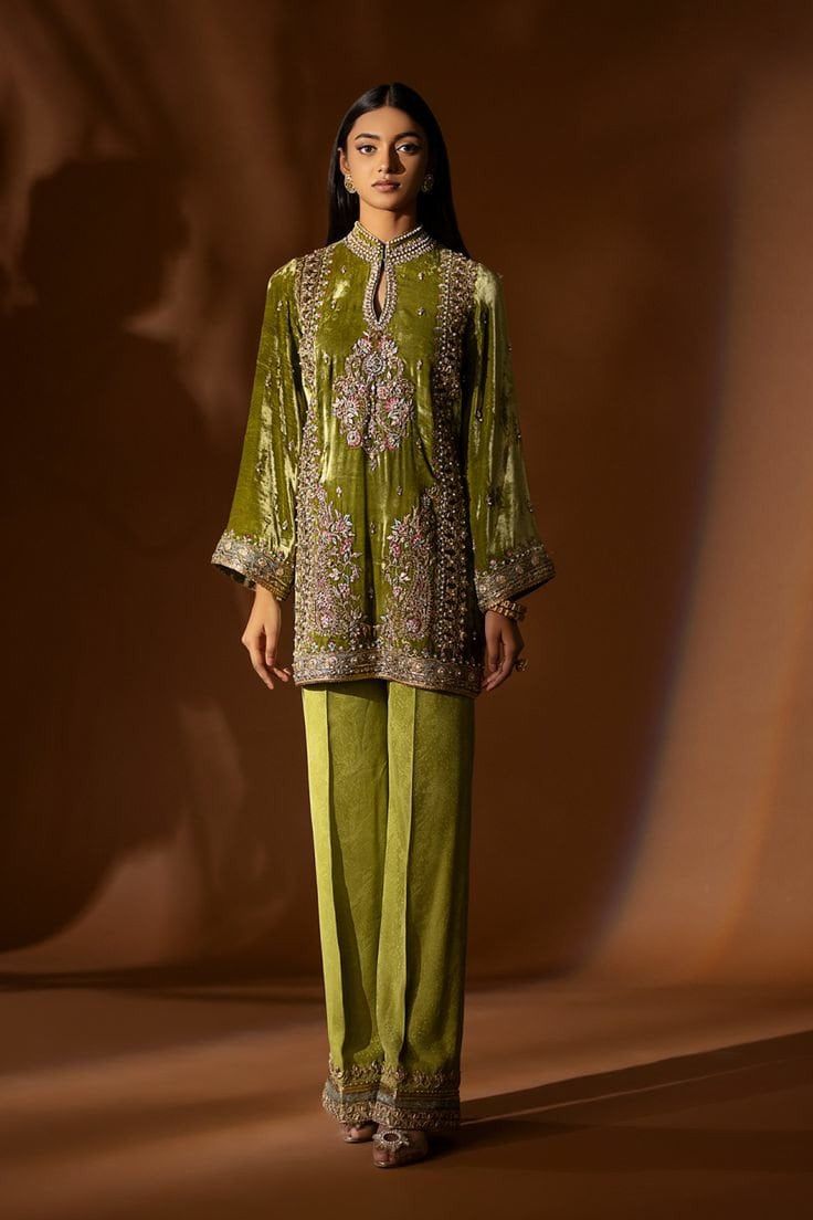 Velvet pant suit,olive green blazer set, wedding pant suit, winter velvet dress,plus size wedding pant suit, velvet Jacket, full sleeves velvet dress. This elegant olive green velvet pant suit has beautiful gota, zari, beads and sequin hand work all over the front, back and sleeves,it has matching raw silk pant with embroidery over the bottom. This elegant design can be wear in any party, wedding and formal functions. ✨We stitched outfit with lot of care, so that our customers should not have an Wedding Pant Suit, Velvet Pant Suit, Green Velvet Suit, Velvet Dress Plus Size, Velvet Suit Design, Pant Suit Set, Velvet Pant, Sleeved Velvet Dress, Silk Pant