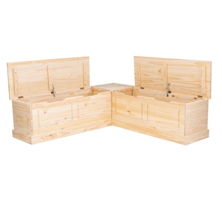 three wooden boxes sitting on top of each other