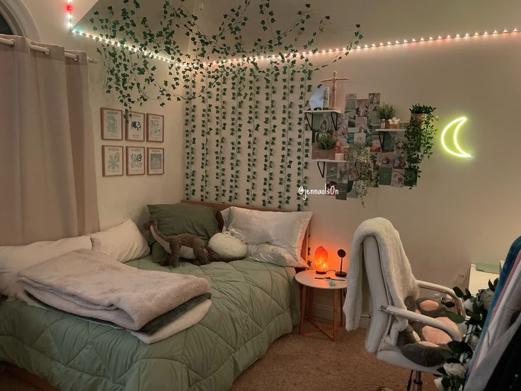 a bed room with a neatly made bed next to a night stand and some pictures on the wall