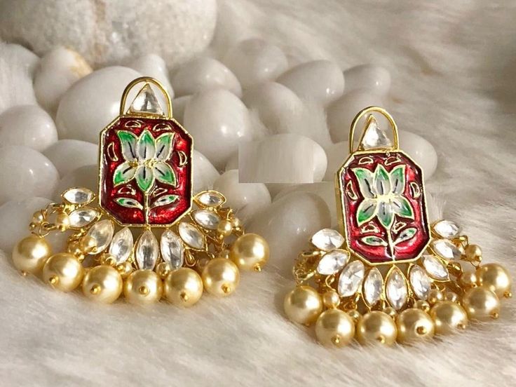 Red/Blue Kundan Meenakari Chandbali/Matte Gold Kundan/Flower/Golden Pearl Chandbali/Traditional Kundan Gold earrings/Ethnic Earrings/Chandelier Indian Earrings/Chandbali/Meenakari/Bollywood Features: -Length: Approx. 2.25 Inches -This pair of earring is made in Matte Gold finish with Semi precious stone beads with Push back closure. -Stunning Lotus Meenakari Earrings perfect with Any Glam or Formal Dressing for Mehndi, Diwali, or whenever you want a Lovely Ear Adornment. -Gold Plated, Highest Qu Red Jhumkas For Ceremonial Use During Diwali, Red Temple Jewelry Earrings For Navratri, Ceremonial Red Meenakari Jhumkas, Traditional Red Chandbali Danglers, Gift Red Chandbalis, Traditional Red Chandbalis For Diwali, Red Handmade Bridal Earrings For Festive Occasions, Elegant Ceremonial Earrings With Motifs, Red Bollywood Style Chandbalis For Navratri