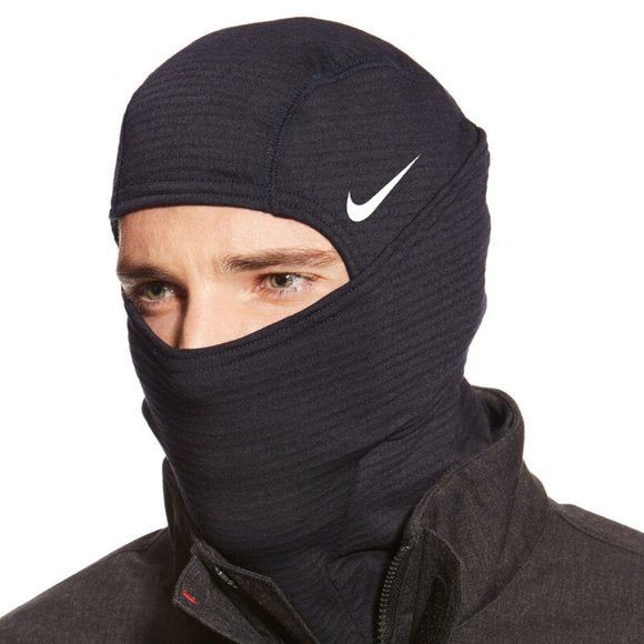 Convertible foldover design with eye opening for optimal visibility Therma-Sphere fabric with Dri-FIT technology delivers moisture wicking Balaclava style offers comfort and protection for external elements Nike Swoosh logo graphic above eye and reflective vertical stripe in the back Sports Balaclava With Adjustable Hood, Black Windproof Activewear For Winter, Black Windproof Winter Activewear, Functional Moisture-wicking Balaclava For Winter, Winter Sports Activewear With Fleece Lining, Black Sports Balaclava With Fleece Lining, Black Windproof Activewear For Sports, Breathable Winter Activewear For Outdoor, Black Fleece-lined Balaclava For Sports