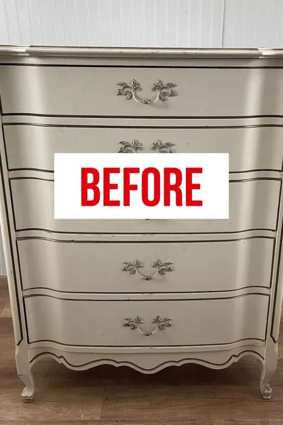 an old dresser has been painted white with red lettering that says before on the bottom