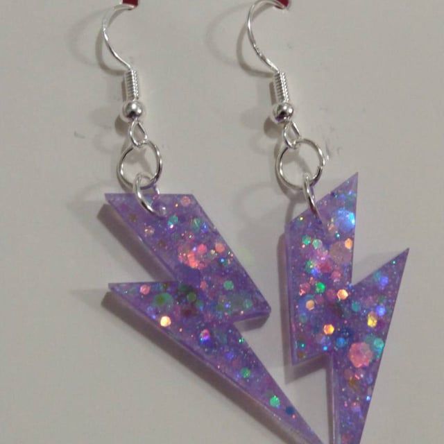 Purple Sparkly Lightning Bolt Earrings Handmade Holographic - Etsy Fun Handmade Silver Earrings, Handmade Fun Silver Earrings, Handmade Silver Fun Earrings, Fun Purple Earrings For Gift, Purple Novelty Jewelry For Pierced Ears, Purple Plug Earrings As Gift, Fun Purple Dangle Jewelry, Purple Plug Earrings For Pierced Ears As A Gift, Fun Purple Jewelry For Gifts