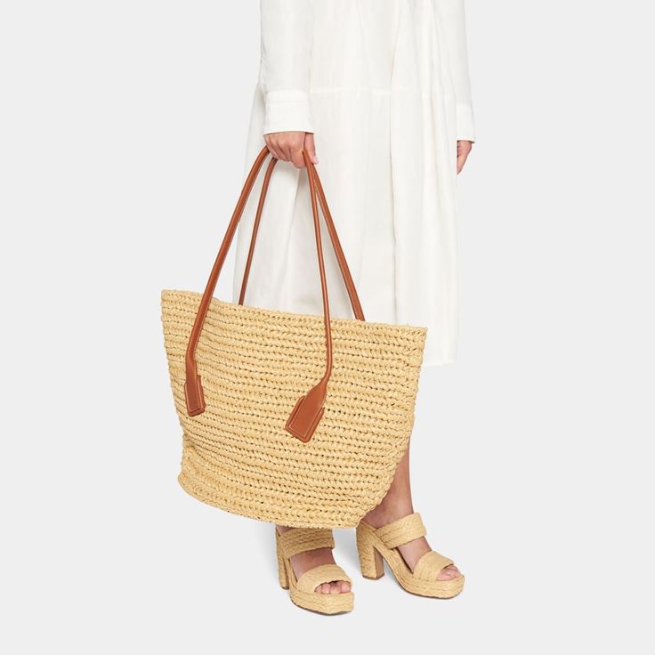 Bottega Veneta "Arco" shoulder bag in crochet raffia and calf leather  Flat shoulder straps  Open top  Interior, leashed zip pouch bag  Approx. 14.8"H x 23.2"W x 13"D Made in Italy Chic Crochet Bag With Intrecciato Weave For Shopping, Top Handle Straw Bag With Intrecciato Weave, Beige Intrecciato Weave Crochet Beach Bag, Beige Crochet Bag With Intrecciato Weave For Beach, Beach Crochet Bag With Intrecciato Weave And Top Handle, Straw Shoulder Bag With Intrecciato Weave And Double Handle, Double Handle Straw Shoulder Bag With Intrecciato Weave, Summer Straw Bag With Intrecciato Weave And Double Handle, Beige Intrecciato Weave Straw Bag