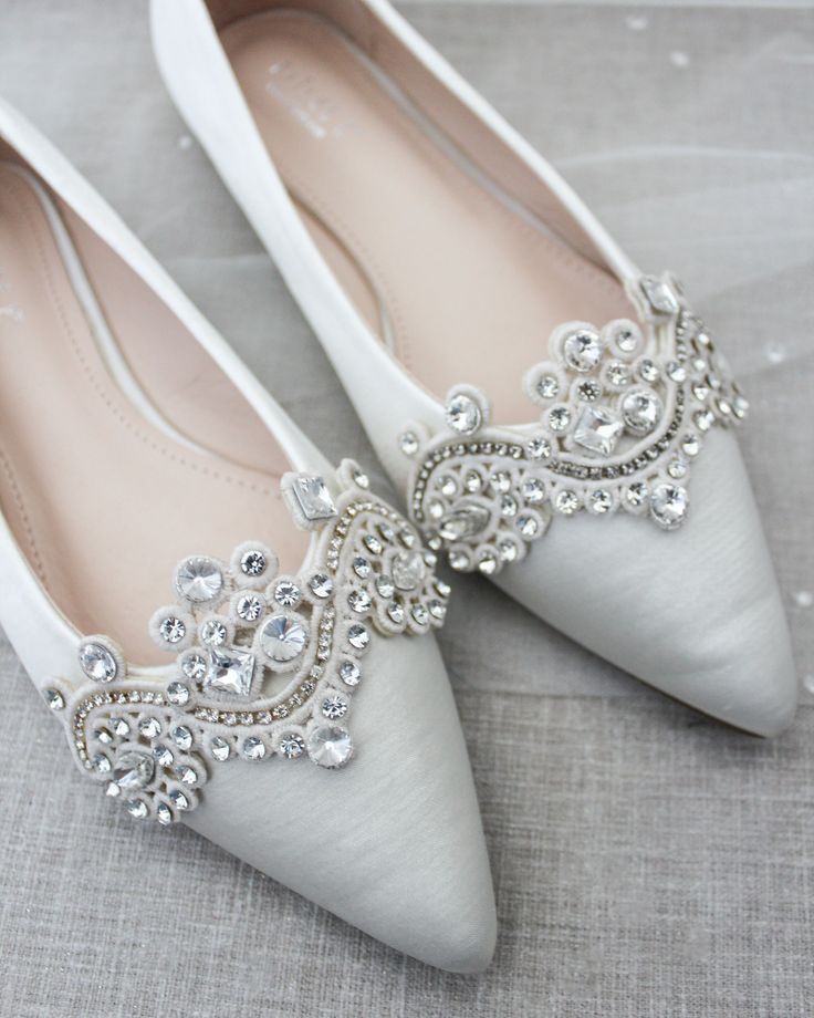 Chic satin pointy toe flats with rhinestone appliqué. Perfect simplicity for bride and wedding party. Detail:COLORS AVAILABLE: White, Ivory, Blush Pink, Champagne, Rose Gold Metallic, Aqua Blue and Royal Blue SatinUPPER: Synthetic upper and liningMATERIALS: Mandmade outsole STYLE NAME: VANITA Champagne Rose, Wedding Flats, Pointy Toe Flats, Rhinestone Appliques, Rhinestone Wedding, Decorated Shoes, Elegant Chic, Pink Champagne, Formal Wear