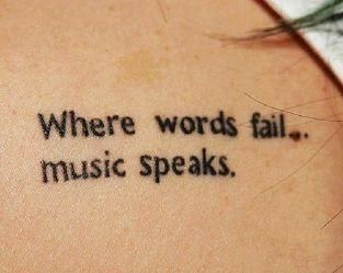 a tattoo with words written on it that says, where words fail music speaks