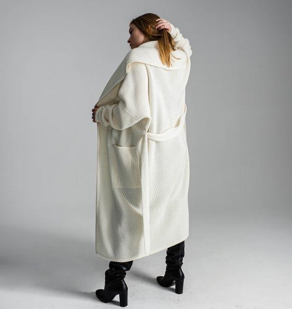 White cardigan Light coat Oversized cardigan Chunky sweater Basic clothing Chunky loose knitwear Long coat Minimal clothing Kimono cardiganOne size fits for XS-M/LFree shipping worldwideThis item can be made in any size and color (1-2 weeks for production). Contact us, and we will advice about color availability and measures required. The wool is machine washable with program of "wool" or "delicate" Low temp. 30°Designed & Created by Gurenkova Knitwear Oversized Long Outerwear In Winter White, Long Chunky Knit Sweater Coat For Winter, Long Chunky Knit Winter Sweater Coat, Oversized Beige Shawl Collar Outerwear, Oversized Long Beige Sweater Coat, Cream Open Front Sweater Coat For Winter, Long Beige Chunky Knit Sweater Coat, Oversized Long Cozy Outerwear, Beige Long Chunky Knit Sweater Coat