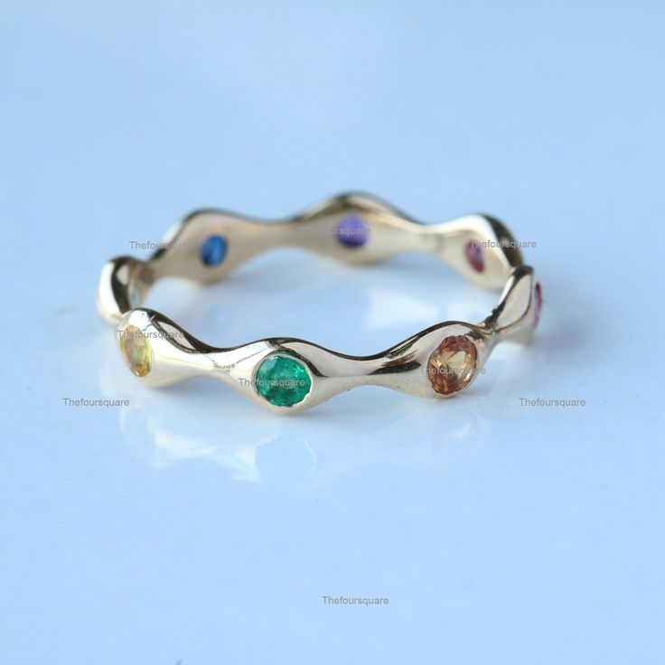 A Dainty & Beautiful Ring Made in Solid 14k/18k Solid Gold. Genuine Multi Gemstone Eternity Distance Wedding Band Jewelry. Also available in Rose Gold, White Gold and Yellow Gold. ★Details ★Purity : Solid 14k Gold ( Also available in 9k & 18k Solid Gold) ★Metal : Yellow Gold ( Also available in Rose Gold & White Gold) ★Gemstone : 100 % Genuine Multi Gemstones ( Also available in Other Gemstone) ★Stone Size : 2.5mm ( Also available in Other Size) ★Stone Weight : 0.66 Ct Approx Ring Si 14k Gold Multi-stone Eternity Band, 14k Gold Multi-stone Round Gemstones, 14k Gold Multi-stone Eternity Band As Gift, Fine Jewelry Multi-stone Round Cut Eternity Band, Round Multi-stone Cubic Zirconia Eternity Band, Fine Jewelry Eternity Band With Multi-stone Round Cut, Round Cubic Zirconia Eternity Band With Multi-stone, 14k Gold Gemstone Eternity Band For Anniversary, Multi-stone 14k Gold Eternity Band For Anniversary