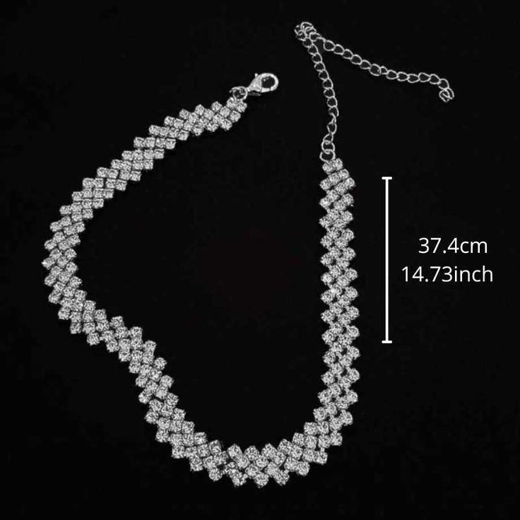 The stones are set in a precious silver-plated metal, and the necklace is designed to gracefully encircle the neck. Top layer: Electroplating for a brilliant finish Material: Silver, Alloy, Metal Sparkling Rhinestones: Full rhinestone water diamond Size: 37.4cm - *14.73inch Adjustable Size: With an extension chain of up to 10cm (3.94 inches). Hypoallergenic: Safe for sensitive skin. Gender: Female Age: Adult Brand Name: NoEnName_Null Product ID: CJLX118897201 Disclaimer: Actual colors may vary. Elegant Alloy Chain Necklace For Wedding, Elegant Alloy Crystal Necklace For Gift, Elegant Crystal Clavicle Chain Necklace, Elegant Alloy Jewelry With Sparkling Stones, Dazzling Sparkling Stones Choker Necklace, Elegant Formal Alloy Necklace, Diamond Clavicle Chain For Party, Elegant Diamond White Necklaces With Rhinestones, Dazzling Choker With Sparkling Stones