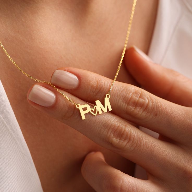 ❤️Perfect Gift for loved ones. ❤️2 initial love necklace with heart ❤️Your purchase will arrive in a gift box ❤️ All our jewelry is handmade with Love and Care in our workshop  DETAILS Material: High-Quality Solid 925 Sterling Silver and 14K Solid Gold Finish: Silver Plated, Rose Plated, Gold Plated, 14K Solid Gold and Solid White Gold  PROCESSING & SHIPPING All items purchased will be shipped within 2-7 business days. You can upgrade your shipping to Express during check out if you want it faster 🚀Standard Shipping Time for the US: 2- 7 business days worldwide 🚀Express Shipping Time: 1-5 business days worldwide  ASSURANCE ✧ Nickel Free ✧ Tarnish Resistant ✧ High-Quality Materials If you have any questions feel free to write Couples Initial Necklace, Dainty Initial Pendant Charm Necklace For Gift, Dainty Initial Pendant Charm Necklace As Gift, Dainty Charm Necklace With Initial Pendant As A Gift, Delicate Initials Charm Necklace For Gift, Personalized Heart Pendant Initial Necklace, Personalized Initial Pendant Necklace For Valentine's Day, Gift Heart Charm Necklaces With Initial Pendant, Minimalist Initial Necklace With Heart Charm As Gift