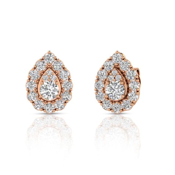 Top off your look in sparkling style with these pear-shaped certified multi-diamond stud earrings in rose gold. Crafted in 14K rose gold Each earring showcases a pear-shaped composite of diamonds, the largest a 1/4 ct. stone. A frame of diamonds surrounds the center. All diamonds are certified and boast a color rank of I and clarity of I2. These 1-1/2 ct. t.w. diamond post earrings secure comfortably with friction backs. Pear-shaped Rose Gold Diamond Earrings, Rose Gold Teardrop Pear-shaped Earrings For Anniversary, Rose Gold Pear-shaped Teardrop Earrings For Anniversary, Pear-shaped Rose Gold Teardrop Earrings For Anniversary, Rose Gold Teardrop Earrings For Anniversary, Diamond Frame, Diamond Stud, Diamond Earrings Studs, Pear Shaped