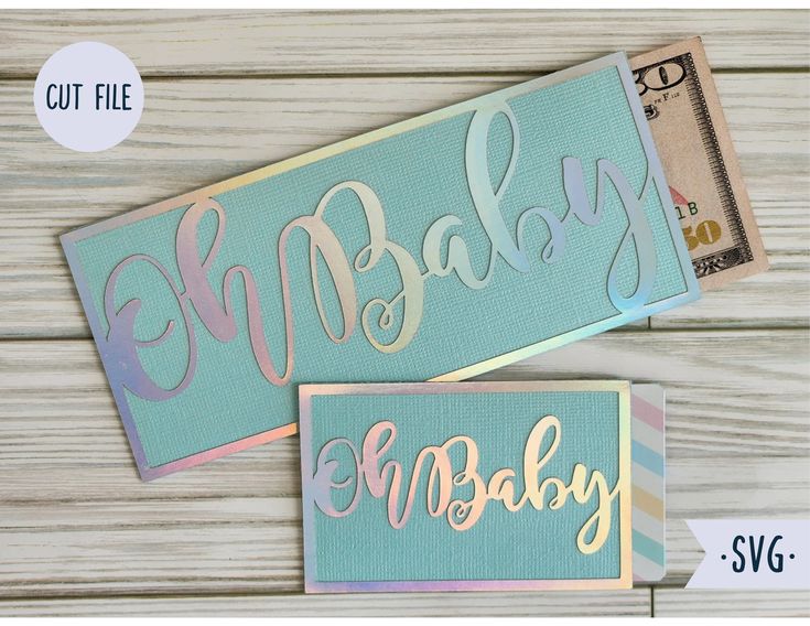 two baby name stickers are shown next to each other on a wooden surface with the words cut file