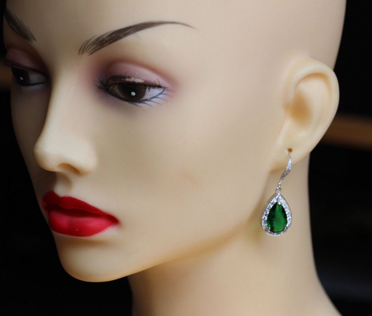 this set made of using zirconia emerald zirconia stone and finished with white gold plated ear wire and chain . necklace is about 16 '' long (40.640cm ) + comes with 2 '' (5.0800cm ) extension chain . earring are 1.2 '' ( 3.0480cm ) from top to bottom length adjustment available upon request Emerald Pear-shaped Necklace For Wedding, Emerald Pear-shaped Wedding Necklaces, Green Round Crystal Jewelry, Elegant Pear-shaped Emerald Jewelry, Wedding Costume Jewelry Teardrop, Hand Set Green Jewelry For Gifts, Hand Set Green Jewelry As A Gift, Green Hand Set Jewelry Gift, Formal Emerald Cubic Zirconia Necklace With Elegant Design