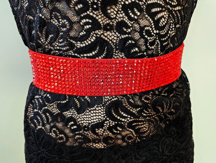 2 inches/ 5cm wide stretchy belt with rhinestones, available in 3 color options. Over 1500 rhinestones make this belt so shining! Other colors are possible under request. Other belts: http://bit.ly/3OREE5O Subscribe to our newsletter with sales: https://alinadancejewelry.com/subscription/ Fitted Bridal Belt With Sashes For Party, Fitted Sashes Bridal Belt For Party, Fitted Rhinestone Belts For Party, Glamorous Party Bridal Belt With Rhinestones, Formal Fitted Sash With Rhinestones, Glamorous Bridal Belt With Rhinestones For Party, Elegant Red Party Sash, Elegant Red Sash For Party, Fitted Rhinestone Sashes For Party