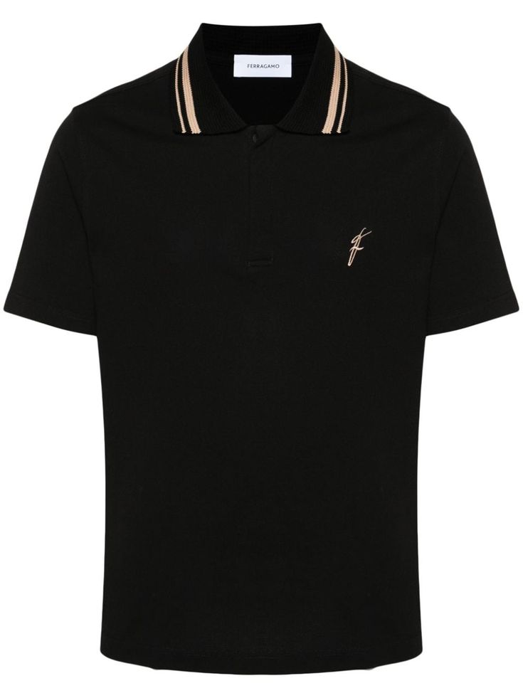 black cotton piqué weave polo collar embroidered logo at the chest short sleeves straight hem short front button fastening Black Cotton Polo Shirt With Striped Collar, Black Polo Shirt With Striped Collar, Luxury Black Polo Shirt With Short Sleeves, Luxury Black Short Sleeve Polo Shirt, Designer Black Cotton Polo Shirt, Designer Black Polo Shirt With Ribbed Collar, Black Cotton Polo Shirt With Embroidered Logo, Designer Black Polo Shirt With Embroidered Logo, Black Collared T-shirt With Embroidered Logo