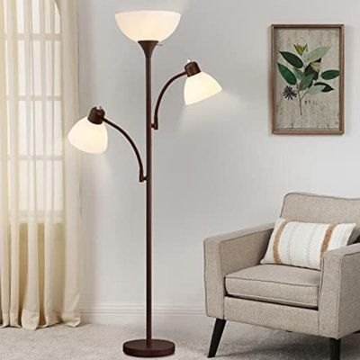 a living room scene with focus on the floor lamp