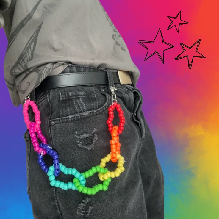 kandi belt chain ! -made with plastic pony beads and white elastic -has two silver metal lobster clasps on each end  -i can do any pride flag so if you have a specific one in mind, feel free to send me a message! :3 Kandi Waist Chain, Clay Bead Bracelet Ideas Pride, Kandi Dragon, Kandi Animals Tutorial, Kandi How To, Spiked Kandi Cuff, Fnaf Kandi Cuff, Kandi Handcuff, Kandi Lanyard