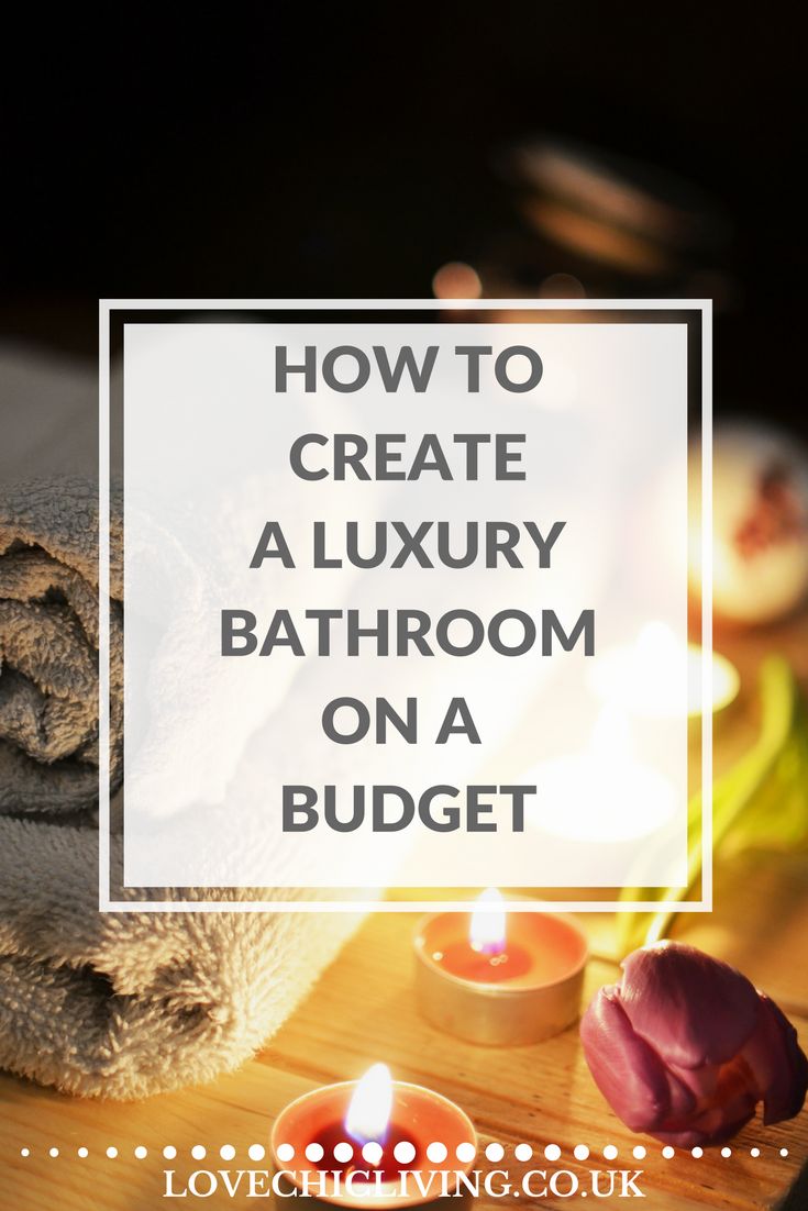 towels and candles on a table with the words how to create a luxury bathroom on a budget