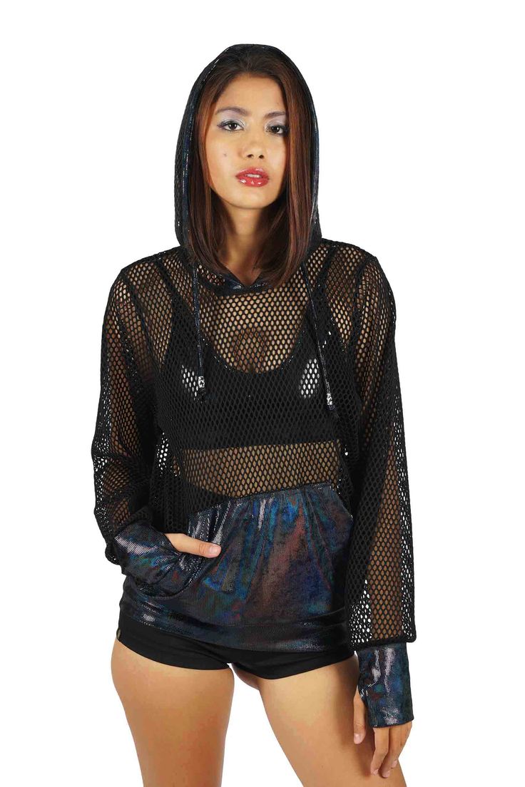 Are you ready to mesh things up? The Showtime black mesh hoodie top is the ultimate in both style and comfort. The black mesh fabric is breathable & ideal for keeping you cool while you dance the night away in style. And let's not forget the accent cuffs and kangaroo pocket in holographic velvet, because who doesn't love a little velvet on their cuffs? But this mesh hoodie isn't just for show – it's also designed for ultimate comfort. Whether you're bouncing around to your favorite DJ or just lo Edgy Black Mesh Top For Club, Black Fishnet Top For Fall, Black Hip Hop Hoodie For Casual Wear, Black Hip Hop Hoodie For Alternative Fashion, Alternative Fashion Black Fishnet Top, Black Fishnet Mesh Top For Night Out, Black Mesh Top With Mesh Sleeves For Club, Spring Streetwear Mesh Top, Black Long Sleeve Fishnet Top