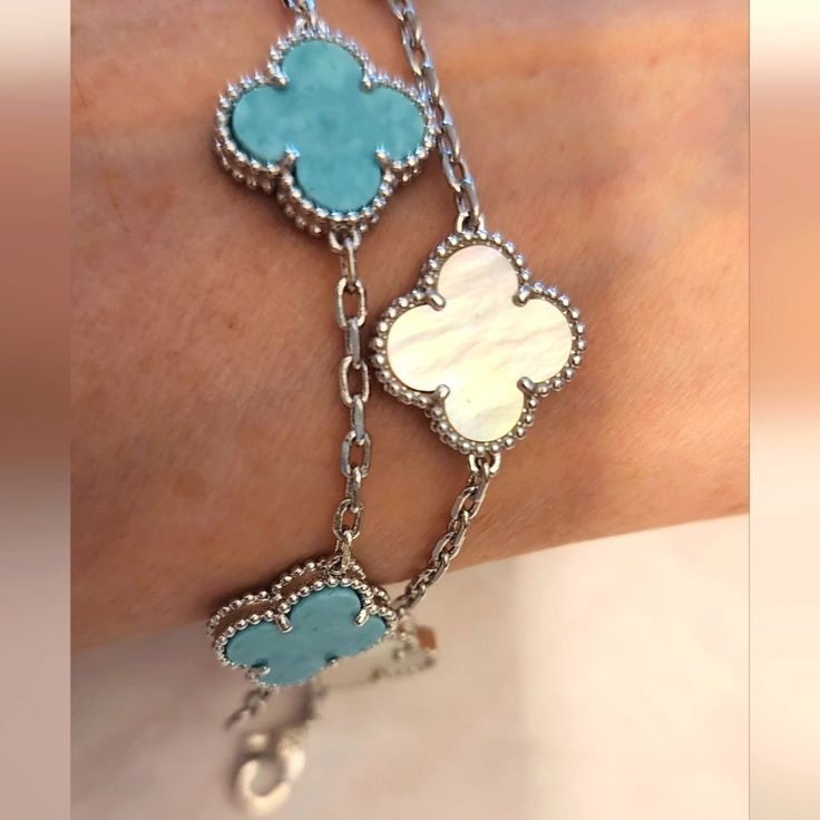 Genuine Stone Double Sided Clover Bracelets. Hypoallergenic And Water Resistant. Alhambra Style Motif. Elegant Turquoise Bracelets With Natural Stones, Luxury White Mother Of Pearl Bracelets, Elegant Silver Mother Of Pearl Bracelets, Fine Jewelry White Bracelets With Gemstone, Fine Jewelry White Gemstone Bracelets, Luxury Natural Stones Bracelets, Fine Jewelry White Gemstone Bracelet, Luxury White Jewelry With Oyster Bracelet, Luxury White Oyster Bracelet Jewelry