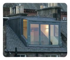 an image of a roof with windows on it