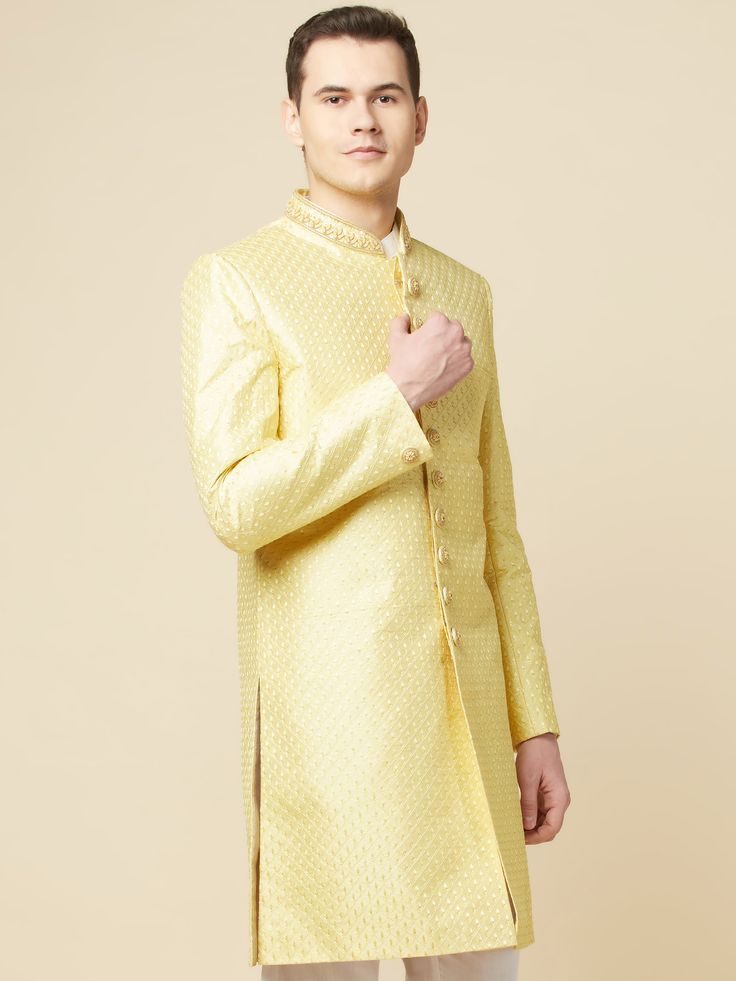 This Lime Yellow Embroidered Sherwani Set will instantly give an elegant look. It features embroidered front buttons fastening, designer cuff buttons and a mandarin collar. The lime yellow sherwani is made of cotton and polyester material with intricate jacquard pattern and premium lining. It is paired with white churidar pants. An ideal outfit for traditional occasions, and special events.

Size Chart For Men





	
	
					Men's Size Chart
		

		
		
						
				Size Chart For Men
				Custom Size Designer Yellow Bandhgala Straight Kurta, Yellow Sherwani With Dabka Work For Designer Wear, Designer Yellow Sherwani With Dabka Work, Yellow Bandhgala With Zari Work For Designer Wear, Elegant Pista Green Bandhgala For Diwali, Yellow Designer Wear Sherwani Straight Kurta, Pista Green Long Sleeve Bandhgala With Intricate Embroidery, Formal Pista Green Sherwani With Chikankari Embroidery, Pista Green Long Sleeve Sherwani With Chikankari Embroidery