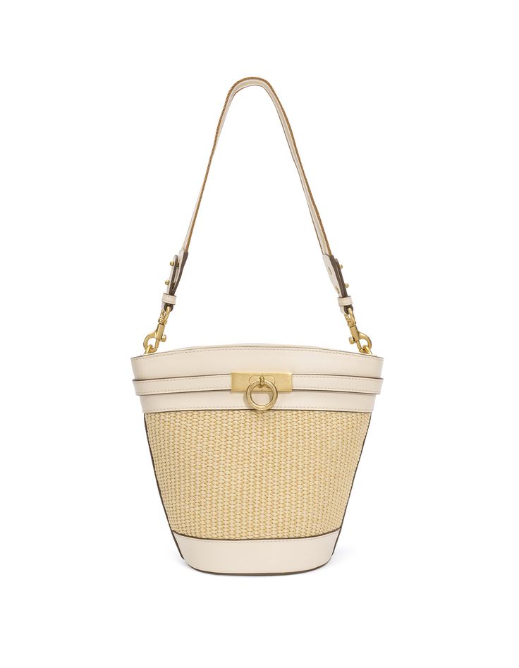 The timeless, trend-setting design of the Unlocked Bucket Bag is simply a must-have. This bag was crafted with full-grain smooth calfskin. Wear it by its adjustable, removable shoulder strap or elegantly draped over your shoulder with an alternative woven strap. With a spacious interior, it is a wardrobe staple for your everyday adventure. - Full-grain smooth calfskin leather from USA - Matching color leather interior - One internal slip pocket - One adjustable leather shoulder strap and one wov Parisa Wang, Wheat Straw, Purses Designer, Perfect Bag, Leather Interior, Picnic Basket, Wardrobe Staples, Color Matching, Wheat