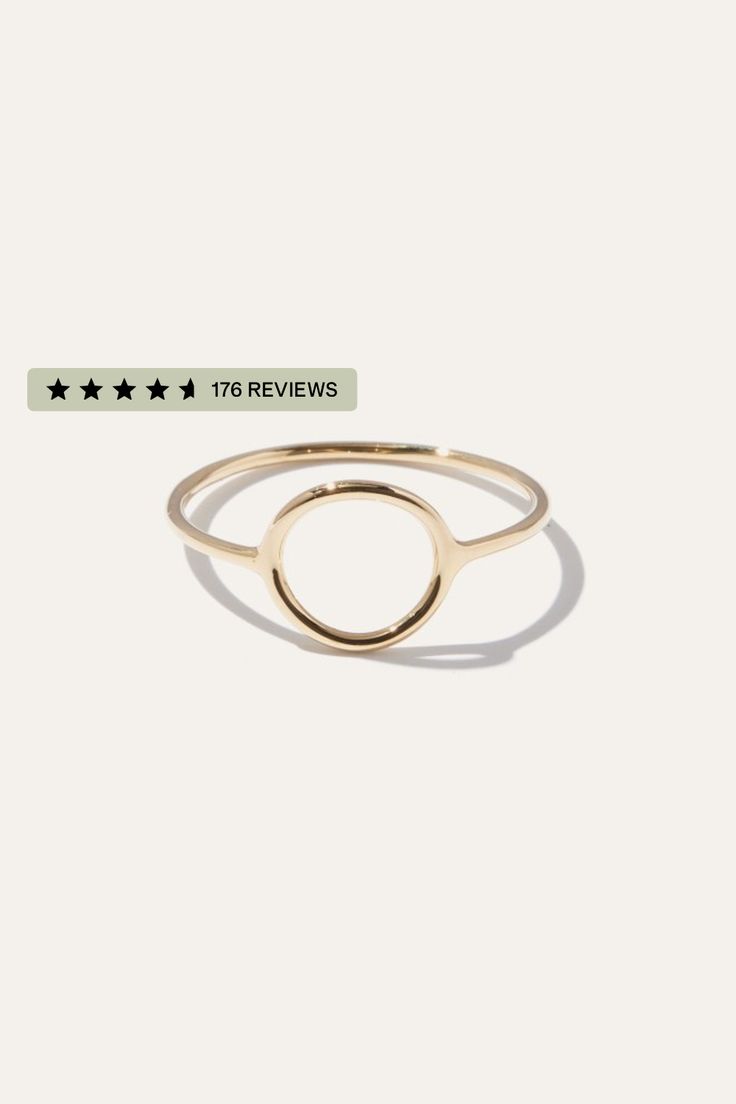 This sleek gold circle ring brings an artful accent to everyday style. Bold enough to wear by itself and minimal enough to compliment a handful of stacked rings. Made in 14k solid gold to stand the test of time.  | Quince | Women's 14k Circle Ring in Yellow Gold, 14k Gold, Size 6 Modern Open Circle Jewelry With Ring Detail, Yellow Gold Initial Ring For Everyday, Everyday Yellow Gold Initial Ring, Timeless Everyday Initial Ring, Gold Stackable Rings With Halo For Everyday, Modern Everyday Stackable Rings With Round Band, Timeless 14k Gold Round Midi Rings, Timeless 14k Gold Midi Rings, Modern Yellow Gold Initial Ring