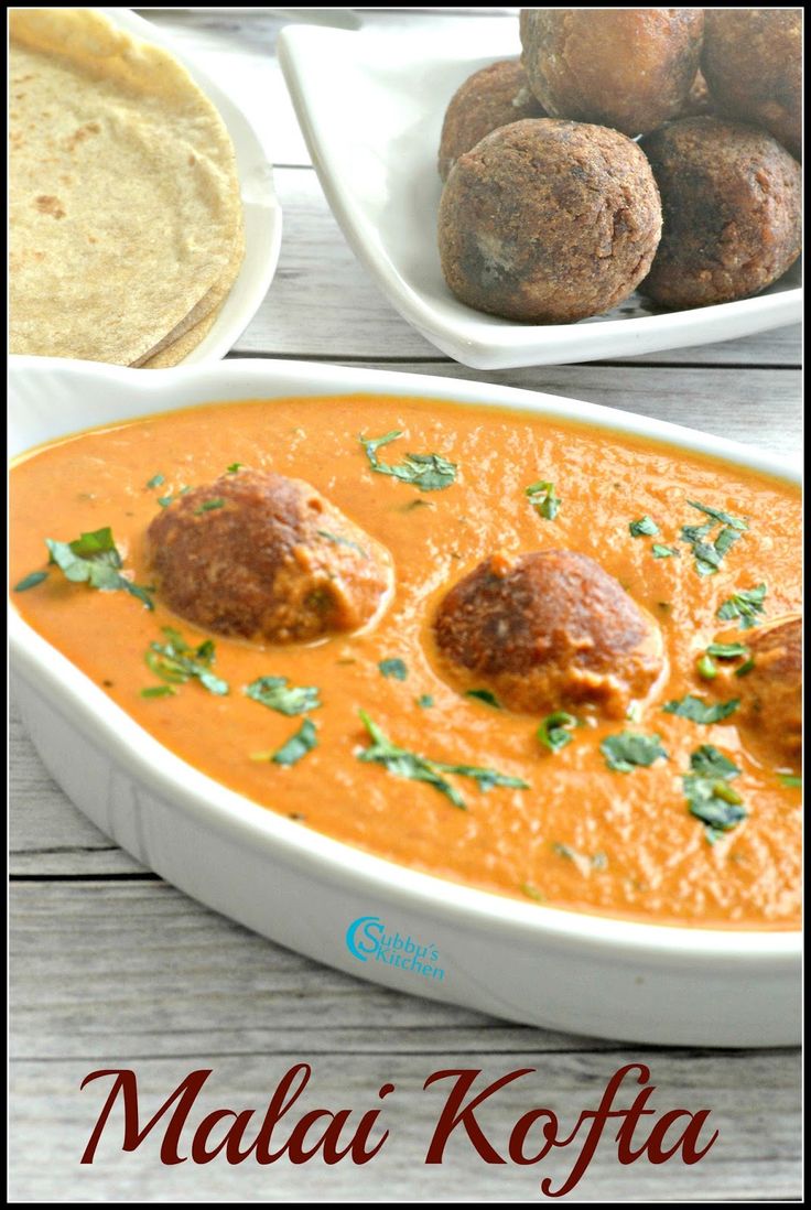 there is a bowl of soup with meatballs in it and the words malai kofta above it