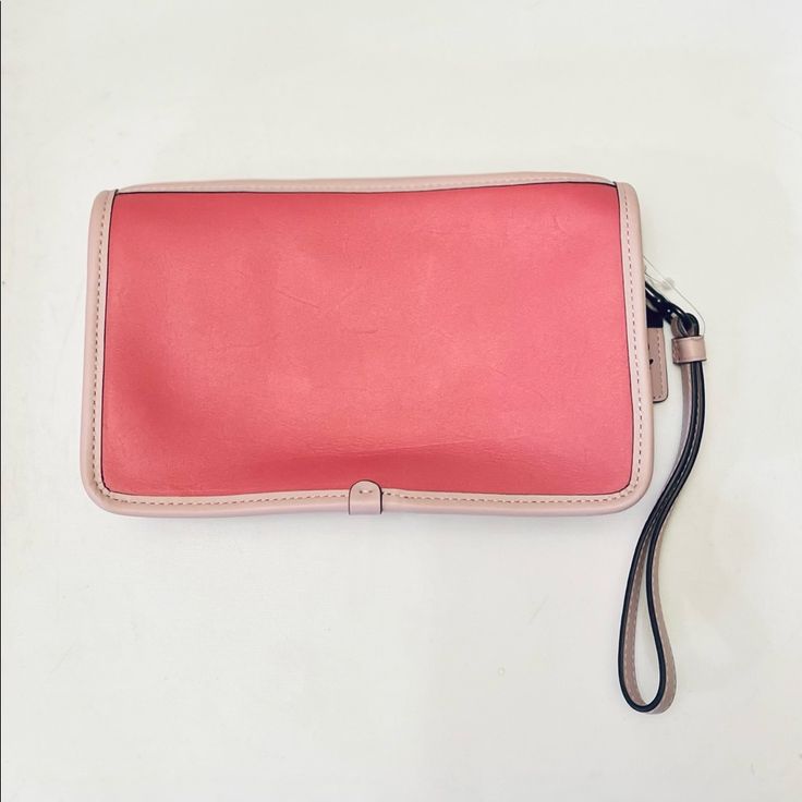 Authentic Designer, Two-Toned Pink Coach Wristlet Wallet. Brand New, Never Used. Measurements: 8”(L) X 5” (H) X 2.5 (W) Coach Clutch With Zipper Closure, Coach Rectangular Clutch With Zipper Closure, Coach Clutch With Zipper For Daily Use, Pink Clutch Wristlet, Coach Clutch Pouch With Zipper Closure, Coach Pouch Wristlet For Travel, Travel Clutch Wallet With Wrist Strap, Travel Wallet Clutch With Wrist Strap, Travel Wallet With Wrist Strap And Clutch Shape