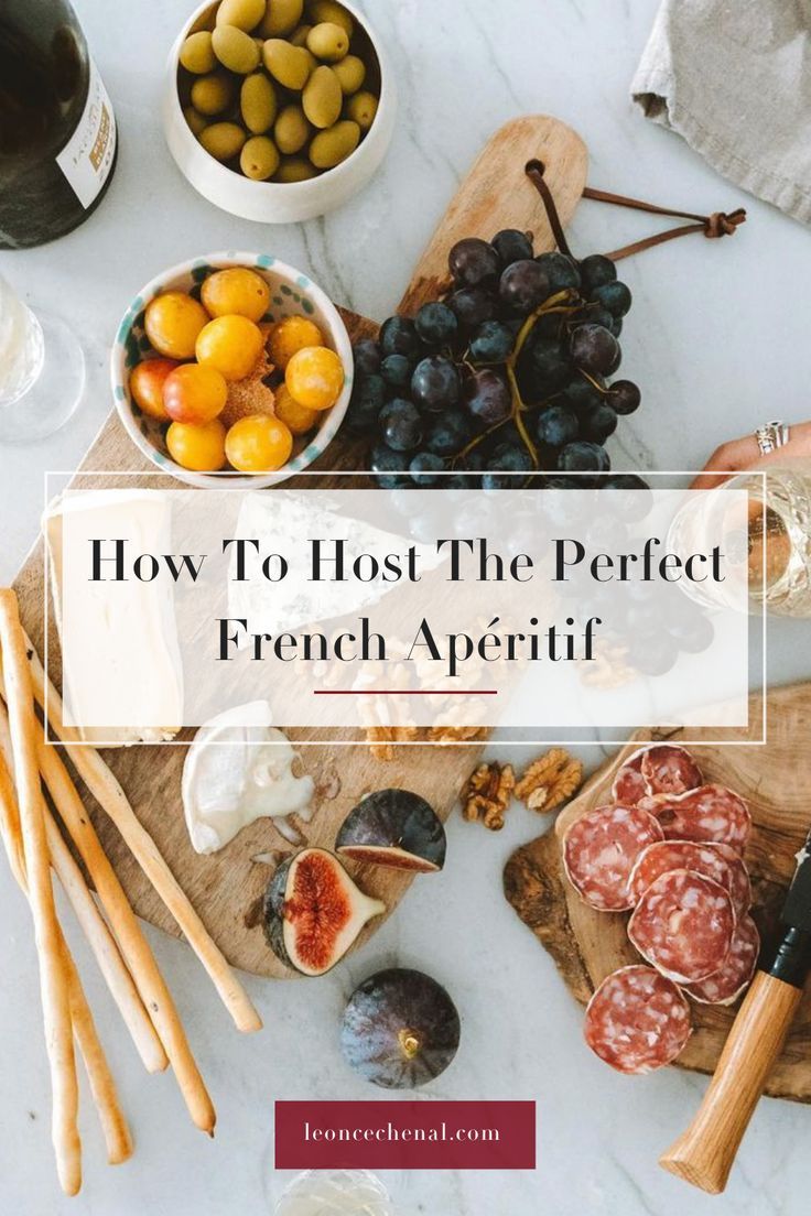 the words how to host the perfect french appetizer on a marble counter top