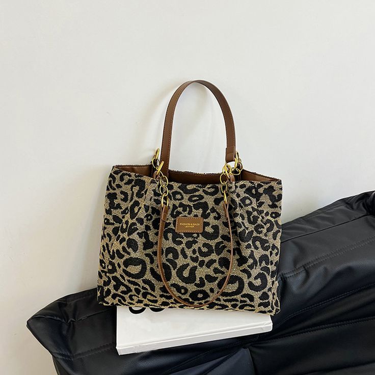 Place Of Origin : GUANG DONG Province Place Of Origin : GUANG DONG Province Types of bags : Shoulder Handbags Occasion : Versatile Exterior : none Interior : Cell Phone Pocket,Interior Zipper Pocket Hardness : SOFT Closure Type : zipper Pattern Type : LEOPARD Gender : WOMEN Style : Casual Decoration : none Number of Handles/Straps : two Lining Material : POLYESTER Handbags Type : Shoulder Bags Main Material : CANVAS Shape : Casual Tote Bag : Shopping Lady Bag Shoulder Bag : Travel Shoulder Bag M Trendy Brown Canvas Bag With Large Capacity, Casual Square Box Bag With Zipper Closure, Trendy Square Box Bag For School, Trendy Square Shoulder Bag For School, Trendy Brown Canvas Shoulder Bag, Casual Large Capacity Satchel Bag, Trendy Handheld Bucket Bag For Daily Use, Trendy Square Satchel For Daily Use, Everyday Square Canvas Bag With Zipper Closure