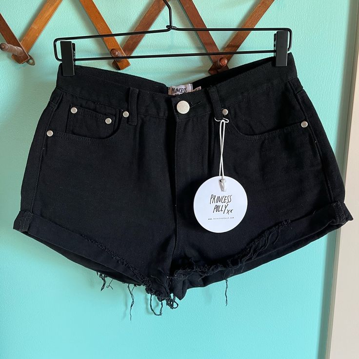 New With Tags Princess Polly ‘Eddie’ Black High Waisted Cutoff Denim Jean Shorts. Size Us 8. No Flaws Tags: Retro Mod 50s 60s 70s 80s 90s Y2k Urban Outfitters Unif Brandy Melville American Eagle Apparel Levis Mom Flare Jeans Bell Bottoms Free People Forever21 Zara H&M Anthropologie Boho Reformation Doen Christy Dawn Jcrew Modcloth Nasty Gal Daydreamer Everlane Madewell Abercrombie And Fitch Shein Asos Pretty Little Thing Boohoo Missguided Vintage Fitted Black Jean Shorts With Frayed Hem, Chic Black Cotton Jean Shorts, Washed Black Mid-rise Relaxed Fit Jean Shorts, Black Mid-rise Jean Shorts With Belt Loops, Black Mid-rise Denim Shorts, High-rise Black Jean Shorts With Pockets, Jeans Bell Bottoms, Washed Black Denim Bottoms With Built-in Shorts, Christy Dawn