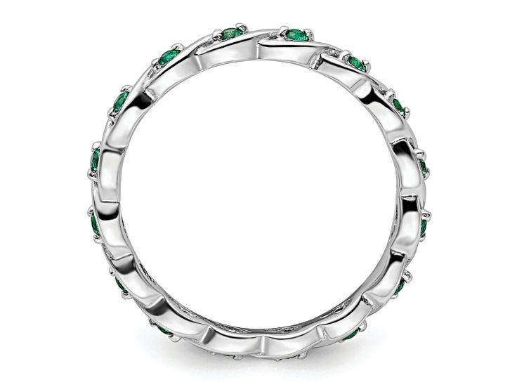 Sterling silver 0.22 cttw round created green emerald stackable ring with polished finish. Band width measures approximately 1/8". Green Diamond Stackable Round Ring, Green Diamond Stackable Ring, Green Diamond Stackable Ring With Round Cut, Green Stackable Diamond Ring With Round Cut, Stackable Green Diamond Ring, Green Stackable Round Diamond Ring, Green Emerald Stackable Ring, Lab Created Emerald, Stackable Ring