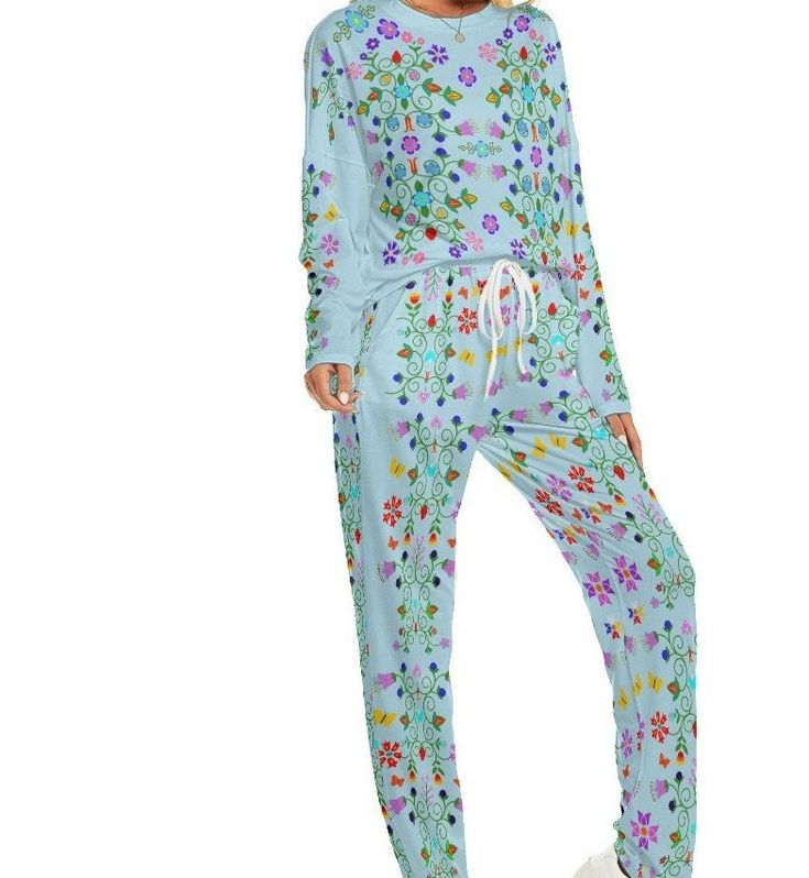 Floral Women's Pajama Set Suitable to be worn at home, with soft and comfortable fabric Fabric: 88% polyester and 12% spandex Regular fit Drop shoulder, long sleeve, crew neck, suits of T-shirt and pants Care Instruction: machine wash cold with similar colors, do not bleach, tumble dry low, do not iron, do not dry clean. This product is made on demand Comfortable Long Sleeve Winter Sets, Blue Long Sleeve Sleepwear For Lounging, Comfortable Long Sleeve Lounging Sets, Casual Printed Long Sleeve Sleepwear, Casual Long Sleeve Printed Sleepwear, Blue Long Sleeve Casual Sleepwear, Casual Blue Long Sleeve Sleepwear, Casual Long Sleeve Blue Sleepwear, Winter Sets With Relaxed Fit And Long Sleeves