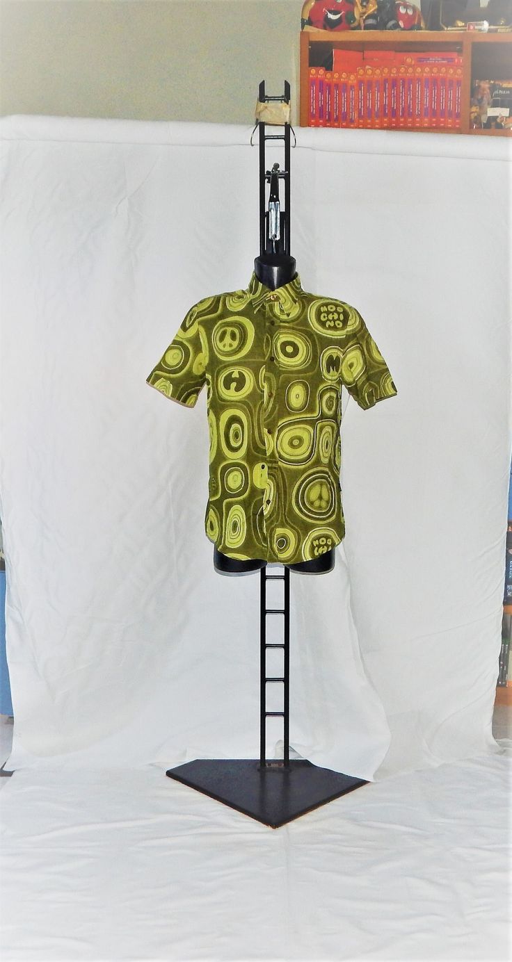 "Vintage 1980s MOSCHINO JEANS Exclusive  Men's  Shirts  Authentic MOSCHINO JEANS, made in italy ! .  Psychedelic pattern design Printed  Viscose/Polyester GOOD Condition   Size M . PLS Read Shirts measurements below Shoulder to shoulder 16.5 inches , 42 cm Armpit to Armpit 19.5 in. , 50 cm ( Chest 39\") Lenght 28.5 in, 73 cm. Post from Italy . Washed and sanitized. Item Posted from Italy This is a PRIVATE SALE The Photos are Real of the Items I sell in this auction. IF YOU HAVE QUESTION PLEASE C Green Casual Shirt With Retro Print, Casual Green Shirt With Retro Print, Retro Patterned Printed Shirt, Retro Printed Hawaiian Shirt For Spring, Spring Retro Printed Hawaiian Shirt, Retro Hawaiian Shirt For Spring With Relaxed Fit, Retro Relaxed Fit Hawaiian Shirt For Spring, Retro Spring Hawaiian Shirt With Relaxed Fit, Retro Hawaiian Shirt For Spring