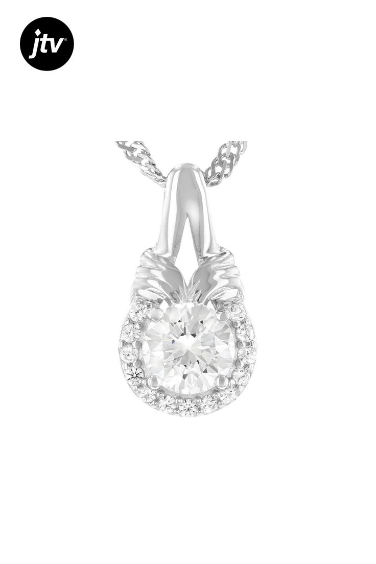 1.10ct 6mm round Lab Created Strontium Titanate and .13ctw 1.25mm round white zircon rhodium over sterling silver pendant with chain. Measures approximately .64"L x .35"W.  Chain has lobster claw closure with 2-inch extender. 2mm bail. Color may vary Accent stones primarily zircon. Diamond Necklace With Center Stone As A Gift, White Gold Oval Pendant Diamond Necklace With Prong Setting, White Gold Necklace With Center Round Stone, White Gold Necklace With Center Stone, Cubic Zirconia Round Cut Necklace With Center Stone, Silver Solitaire Necklace With Diamond Accents, Lab Grown Diamond, Fine Jewelry Diamond Necklace With Center Stone, Diamond Necklace With Center Stone In Fine Jewelry Style, Fine Jewelry Necklace With Round Center Stone