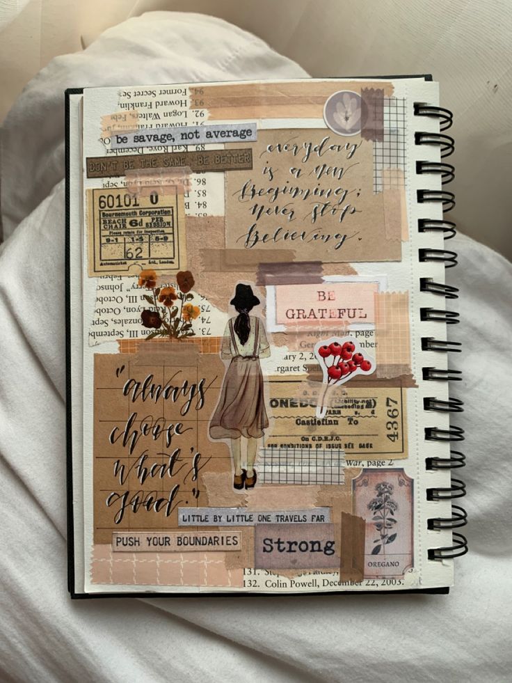 an open notebook with words and pictures on it