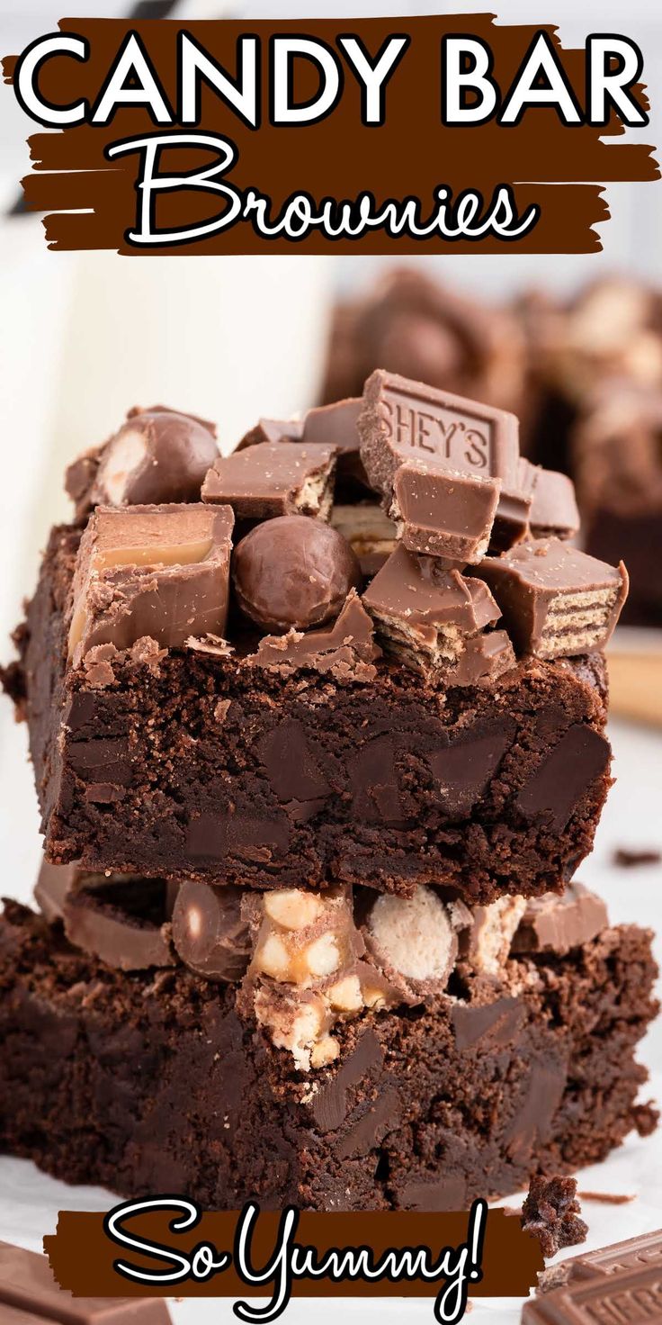 chocolate candy bar brownies stacked on top of each other with the words, so yummy