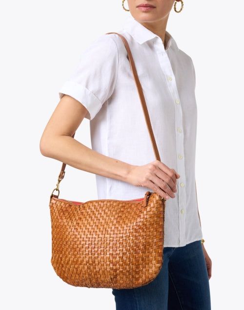 This checker shoulder bag from Clare V. is sure to be your new go-to. The messenger silhouette is crafted from hand-woven Italian leather and features both crossbody and shoulder straps so you can take it from day to night. Style yours with jeans and a tee for an effortlessly cool weekend look. Skirt And Top Dress, Work Accessories, Night Style, Clare V, Clare V., The Messenger, Day To Night, To Night, Clutch Handbag