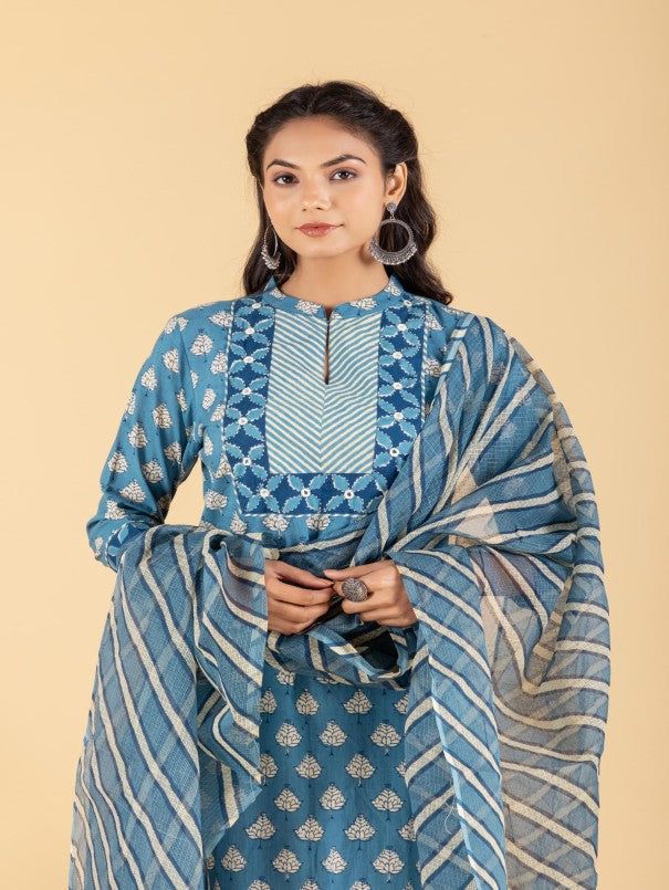 Blue dabu flower printed straight kurta, has a mandarin collar, mirror and katha embroidered yoke, three-quarter sleeves and stripes Print afgani Pants has Elasticated Waistband Fabric: 100% Cotton Color: Blue Note: Available in other colors Wash Care Instruction - Dry Clean Only The product will be shipped within 15-20 days of order placed Size Chart: Kurta Size XS S M L XL XXL XXXL Bust 36 38 40 42 44 46 Waist 32 34 36 38 40 42 Hip 38 40 42 44 46 48 Shoulder 14 14.5 15 15.5 16 16.5 Armhole 18 Indigo Kurta With Dupatta For Eid, Eid Indigo Kurta With Dupatta, Eid Special Indigo Kurta With Dupatta, Indigo Chikankari Embroidery Kurta For Navratri, Blue Cotton Silk Kurta For Spring, Indigo Chikankari Kurta For Navratri, Indigo Salwar Kameez With Resham Embroidery, Indigo Cotton Silk Kurta For Eid, Indigo Salwar Kameez With Chikankari Embroidery