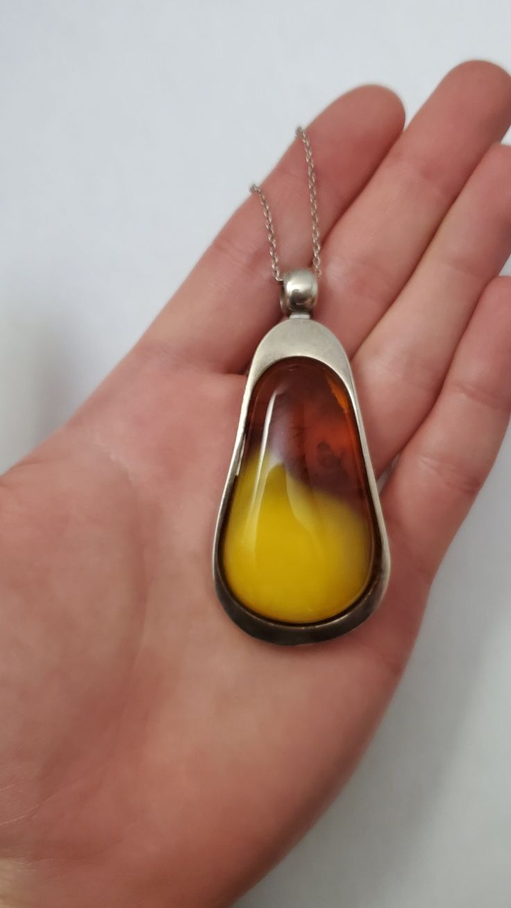 Vintage Sterling Silver Modern Butterscotch Amber Teardrop Pendant Necklace 27.1 grams  Total size: Length 2.5 x Width 1.25 x Thickness 0.5 inches Chain size: Length 18.75 inches Total weight: 27.1 grams Tested: Sterling Silver Teardrop Pendant, New City, Jewelry Inspo, Vintage Sterling Silver, Pendant Necklaces, Costume Jewelry, Favorite Jewelry, Jewelry Necklace Pendant, Amber