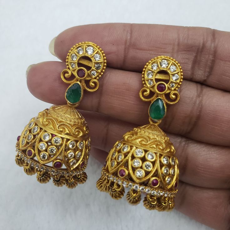 "Handmade Indian Temple Jewelry, best to wear it for traditional ceremonies or Indian wedding. This bridal jewelry has ethnic finish. It has very small Cubic Zircon stones. It is a Bollywood style one gram jewelry These Jhumka Earrings set have an excellent finish and gives out an exquisite sense of style. If you are looking for an amazing Fashion Jewelry set for special occasions such as Anniversary, Engagement, Party, Wedding or for gifting, then your search ends here.. Earring Length: 2.5\", Wedding Jhumkas With Intricate Dangle Design, Wedding Dangle Jhumkas With Intricate Design, Ornate Gold Plug Earrings For Wedding, Temple Jewelry Bridal Drop Earrings For Celebration, Celebration Temple Jewelry Bridal Drop Earrings, Temple Style Bridal Drop Earrings For Celebration, Wedding Chandbali Jhumkas With Matching Earrings, Intricate Round Jhumkas For Wedding, Wedding Drop Jhumkas With Latkans