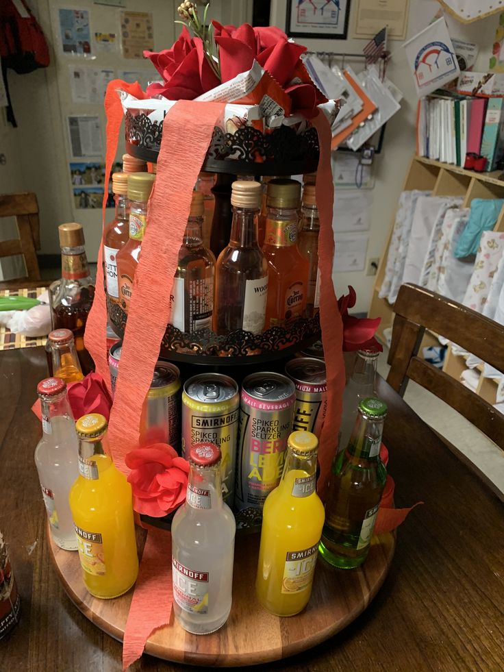 a wooden table topped with lots of bottles and condiments