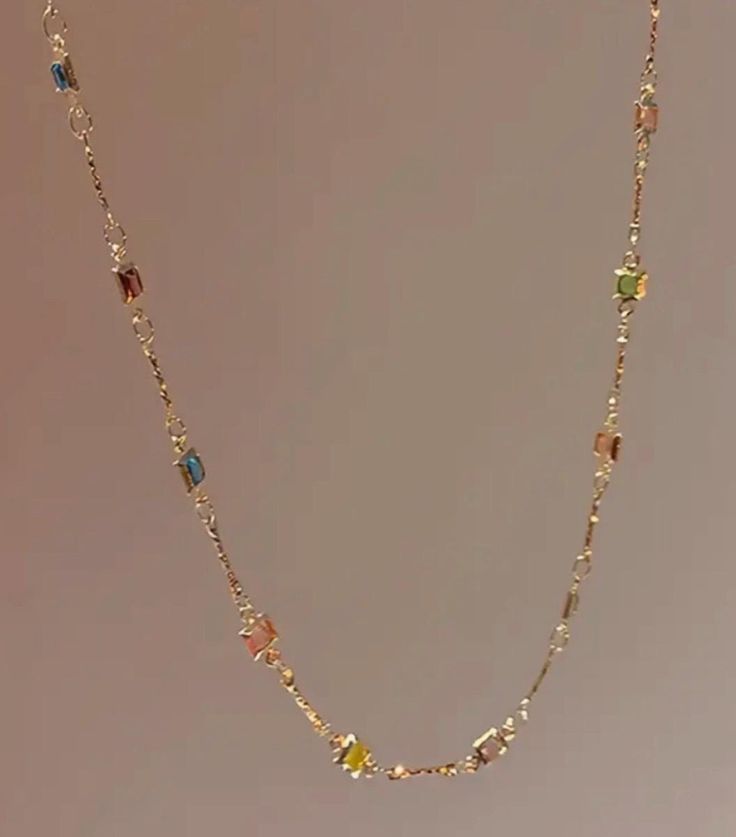 Dainty Gold Filled Necklace, fits perfectly like a choker, handmade to perfection for everyday or occasional wear. It is hypoallergenic and is measured at 9" long and 6" in width. It can be worn with other dainty jewelry or on its own. Multicolor Crystal Necklaces With Adjustable Chain, Multicolor Crystal Necklace With Adjustable Chain, Elegant Multicolor Necklace With Delicate Chain, Multicolor Crystal Clavicle Necklace, Multicolor Jeweled Choker Necklace, Dainty Gemstone Necklaces For Parties, Multicolor Dainty Jewelry With Delicate Chain, Multicolor Clavicle Chain Choker As Gift, Multicolor Delicate Chain Jewelry For Party