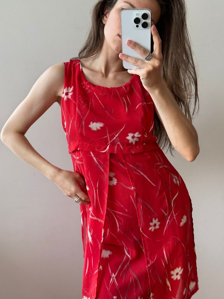 Flowy Sleeveless Rayon Maxi Dress, Red Sleeveless Dress For Summer Vacation, Red Floral Print Elegant Sleeveless Dress, Red Floral Maxi Dress For Spring, Red Floral Casual Summer Dress, Red Casual Floral Summer Dress, Flowy Red Floral Dress For Summer, Chic Red Floral Dress For Summer, Casual Red Floral Summer Dress