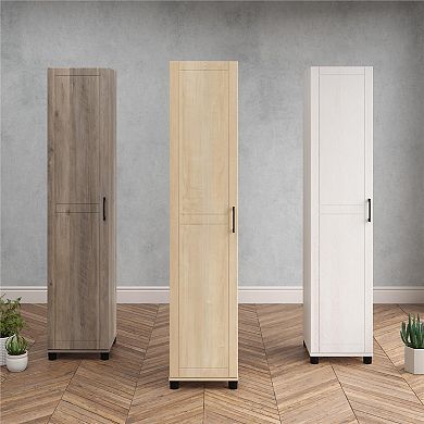 three tall wooden cabinets sitting next to each other on top of a hard wood floor